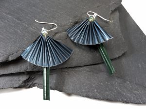 A pair of blue fan earrings