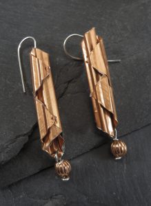 A pair of copper earrings