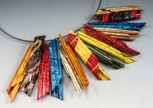 A necklace with metallic pendants